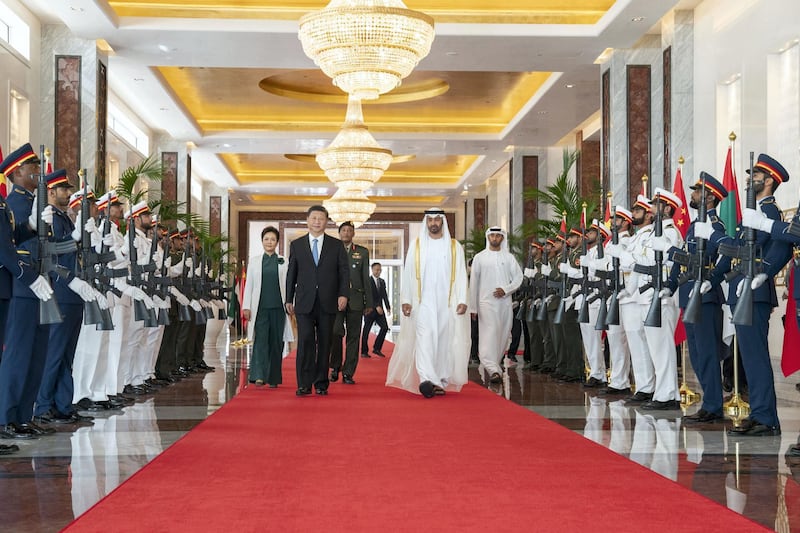 ABU DHABI, UNITED ARAB EMIRATES - July 21, 2018: HH Sheikh Mohamed bin Zayed Al Nahyan, Crown Prince of Abu Dhabi and Deputy Supreme Commander of the UAE Armed Forces (center R) bids farewell to HE Xi Jinping, President of China (center L), at the Presidential Airport. Seen with Peng Liyuan, First Lady of China (L).

( Mohamed Al Hammadi / Crown Prince Court - Abu Dhabi )
---