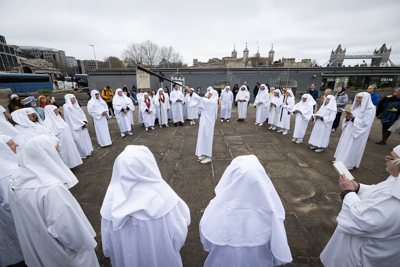 Members of the Druid Order perform a ritual during a celebration of the spring equinox at Tower Hill in London. Getty 