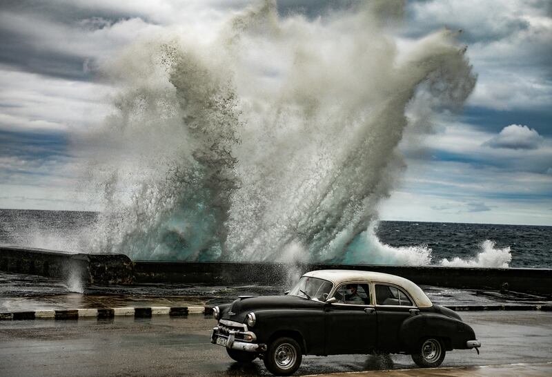 An old American car on the seafront in Havana, Cuba, in February. AFP