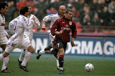12 Dec 1999:  Andrei Shevchenko of AC Milan is chased by the Torino defence of Torino in action during the Italian Serie A match played at the San Siro in Milan, Italy. The game finished in a 2-0 win for Milan. \ Mandatory Credit: Claudio Villa /Allsport