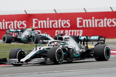 Lewis Hamilton leads his Mercedes-GP teammate Valtteri Bottas on his way to victory in China. Reuters