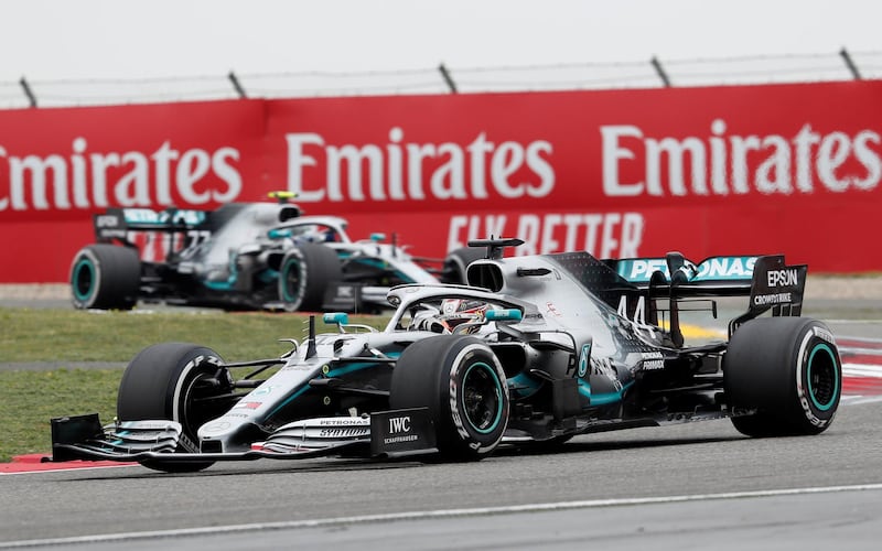 Formula One F1 - Chinese Grand Prix - Shanghai International Circuit, Shanghai, China - April 14, 2019   Mercedes' Lewis Hamilton and Mercedes' Valtteri Bottas in action during the race   REUTERS/Aly Song