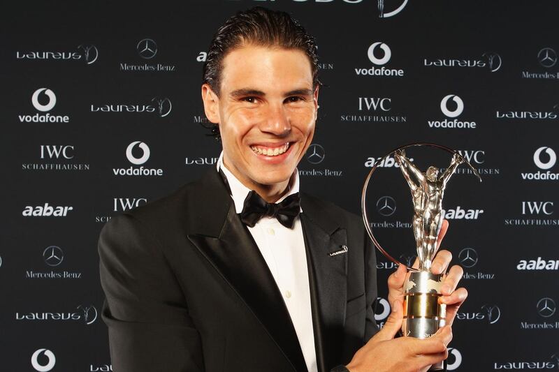 ABU DHABI, UNITED ARAB EMIRATES - FEBRUARY 07:  Tennis Player Rafael Nadal of Spain poses with his award for ÒLaureus World Sportsman of the YearÓ in the winners studio at the 2011 Laureus World Sports Awards at the Emirates Palace on February 7, 2011 in Abu Dhabi, United Arab Emirates.  (Photo by Ian Walton/Getty Images for Laureus) *** Local Caption *** Rafael Nadal