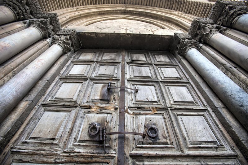 The gigantic closed wooden doors of the  Church of the Holy Sepulchre in the Old City of Jerusalem on Monday February 26,2018.The Church of the Holy Sepulchre  remained closed for a second day after church leaders in Jerusalem closed it to protest against Israeli's announced plans by the cityÕs municipality earlier this month to collect property tax (arnona) from church-owned properties on which there are no houses of worship.
Nadal said he was in mourning for the state of Christians in the Holy Land and said he never in his life saw the church closed before .
(Photo by Heidi Levine for The National).