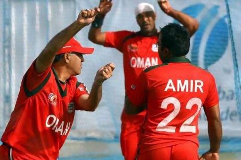 Iqbal Sikander, left, the Oman national team coach, is also a development officer at the Asian Cricket Council. Satish Kumar / The National