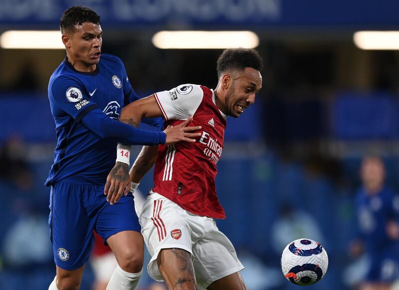 Arsenal's Pierre-Emerick Aubameyang shields the ball from Chelsea's Thiago Silva. EPA