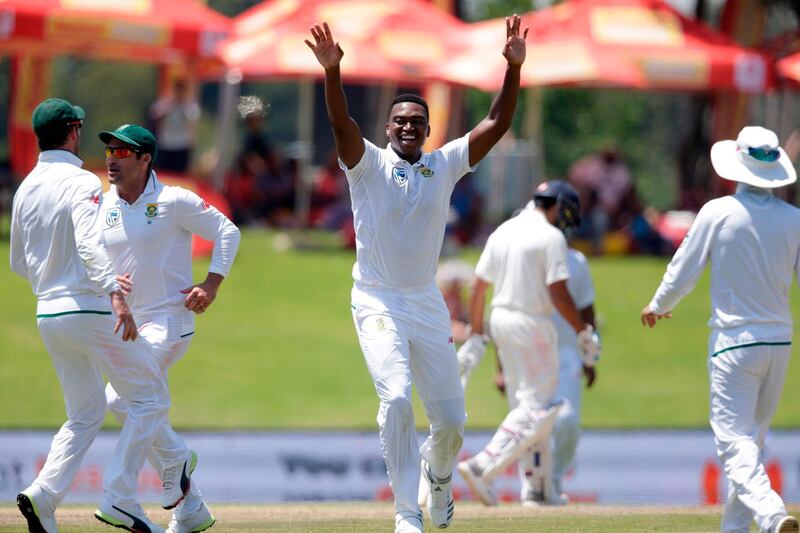 South African bowler Lungi Ngidi (C) celebrates the dismissal of Indian batsman Hardik Pandya (not in picture) during the fifth day of the second Test cricket match between South Africa and India at Supersport cricket ground on January 17, 2018 in Centurion.  / AFP PHOTO / GIANLUIGI GUERCIA