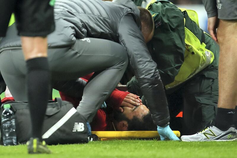 NEWCASTLE UPON TYNE, ENGLAND - MAY 04:  Mohamed Salah of Liverpool receives treatment after an injury during the Premier League match between Newcastle United and Liverpool FC at St. James Park on May 4, 2019 in Newcastle upon Tyne, United Kingdom. (Photo by Robbie Jay Barratt - AMA/Getty Images)