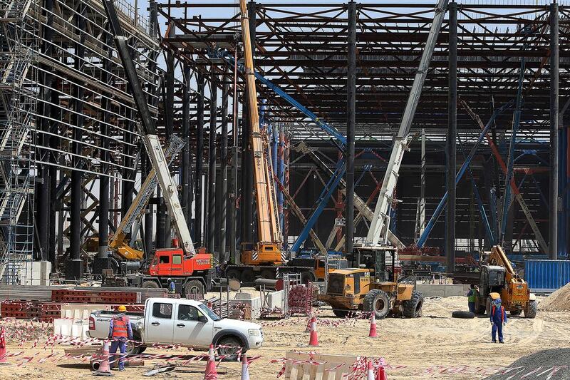 Around 7,800 workers from 27 contracting firms are working on Dubai Parks and Resorts' theme parks. Satish Kumar / The National