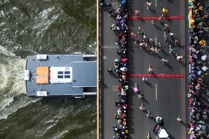 Runners cross Tower Bridge during the London Marathon. Getty Images