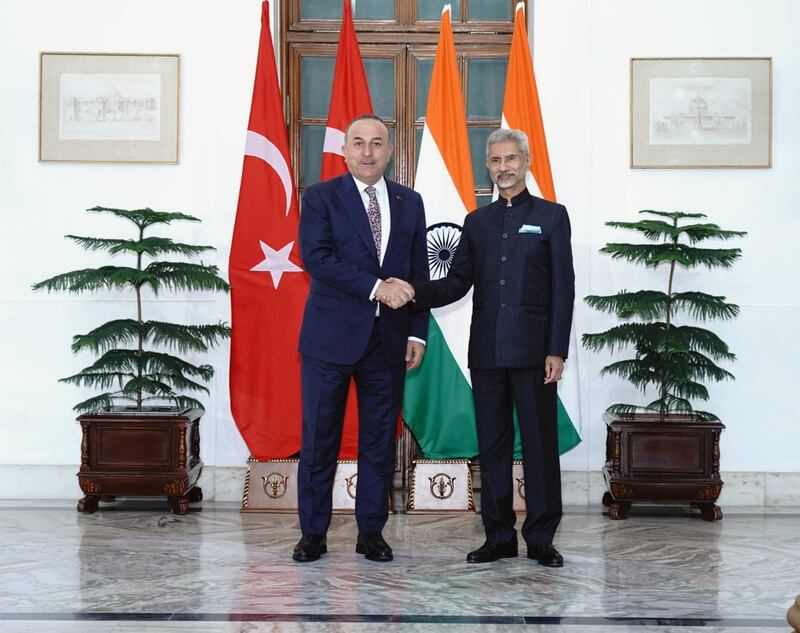 Mr Cavusoglu and Mr Jaishankar on the sidelines of the meeting. Photo: MEA