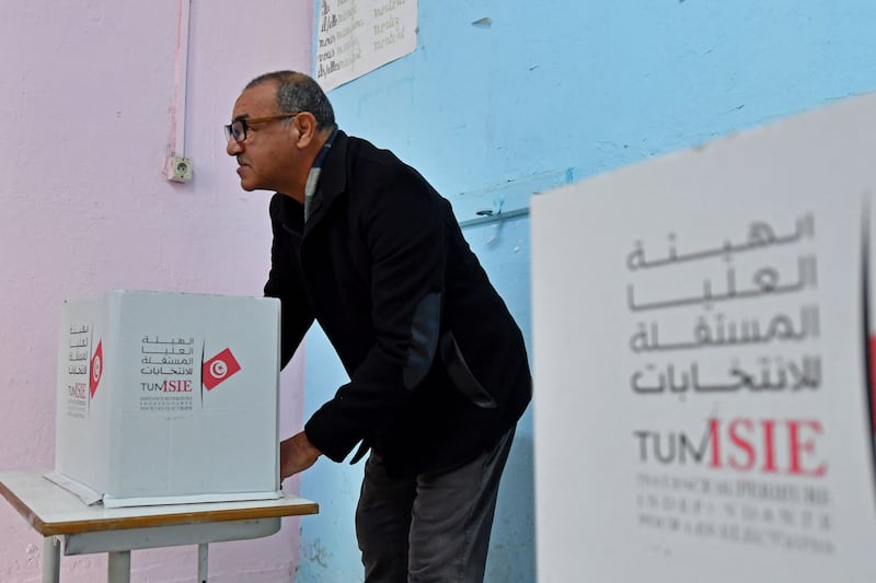 A voter casts his ballot at a polling station in Tunis. AFP