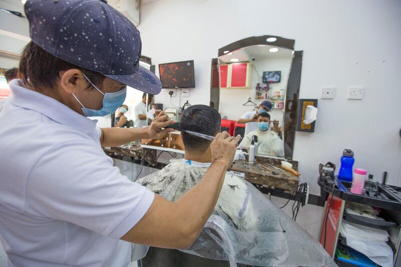 Dubai United Arab Emirates- A barber shop in Satwa is busy with customers  after Dubai lifted its 24hrs quarantine today.  Leslie Pableo for The National