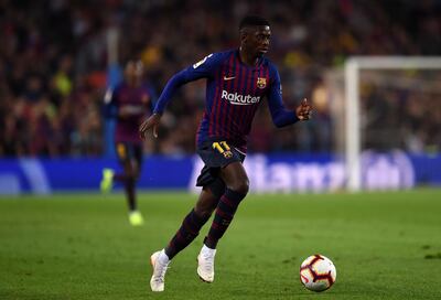 BARCELONA, SPAIN - OCTOBER 20: Ousmane Dembele of FC Barcelona runs with the ball during the La Liga match between FC Barcelona and Sevilla FC at Camp Nou on October 20, 2018 in Barcelona, Spain. (Photo by Alex Caparros/Getty Images)