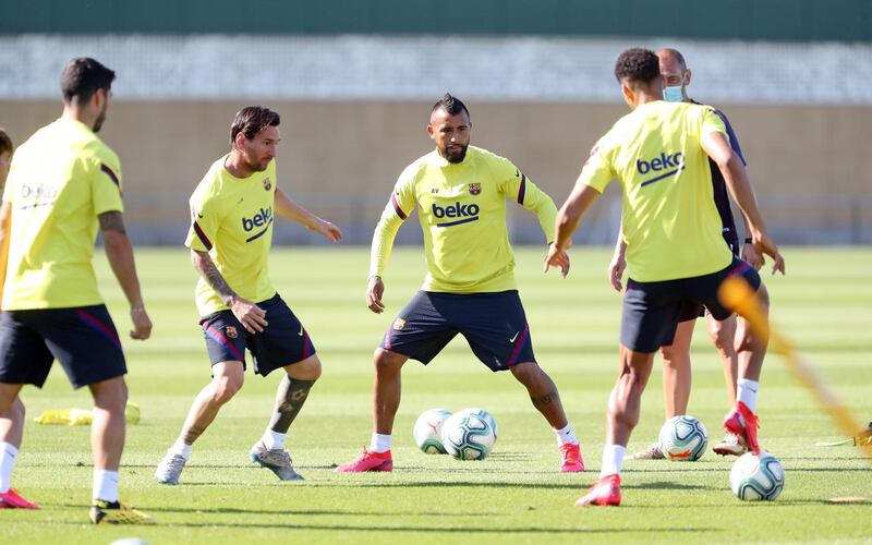 Lionel Messi and Arturo Vidal take part in a Barcelona training session at Ciutat Esportiva Joan Gamper. Getty Images