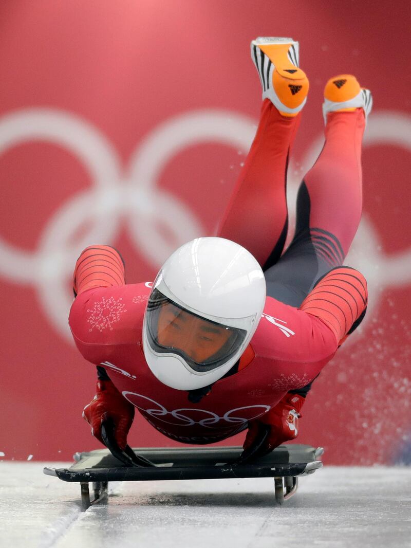 Wenqiang Geng of China starts his practice run during the men's skeleton training at the 2018 Winter Olympics in Pyeongchang. Wong Maye-E / AP Photo