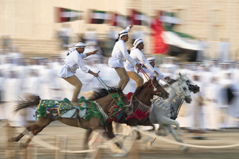 AL WATHBA, ABU DHABI, UNITED ARAB EMIRATES - December 03, 2017: Horsemen participate in the Union March during the Sheikh Zayed Heritage Festival. 

( Mohamed Al Suwaidi for the Crown Prince Court - Abu Dhabi )
---