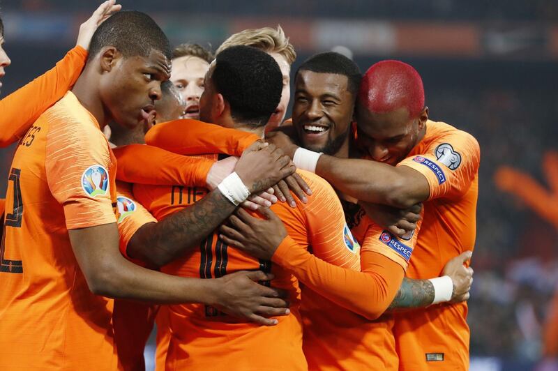 From left: Denzel Dumfries, Depay, de Jong, Wijnaldum and Ryan Babel celebrate during the UEFA EURO 2020 qualifier. EPA