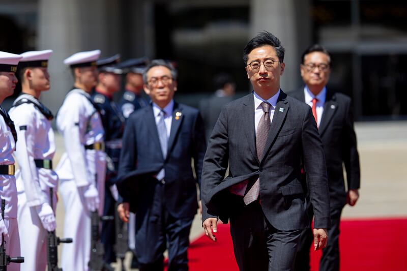 Chang Ho-jin, South Korea's national security director, prepares to greet Sheikh Mohamed in Seoul. Photo: Ryan Carter / UAE Presidential Court