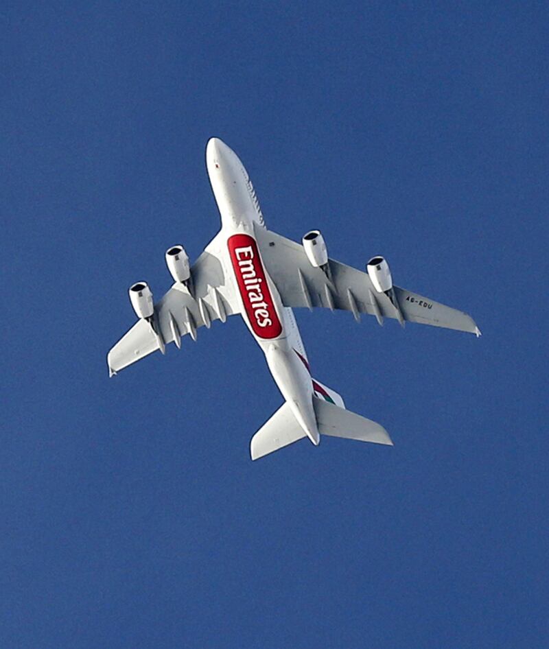 An A380 Emirates Airlines plane flies over Paris. Reuters