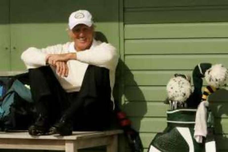 Greg Norman of Australia waits during a delay at the tenth hole during third round play at the 2008 British Open Golf Championship at Royal Birkdale, Southport, northern England, July 19, 2008.     REUTERS/Robert Galbraith (BRITAIN) *** Local Caption ***  GOL737_GOLF-OPEN-_0719_11.JPG