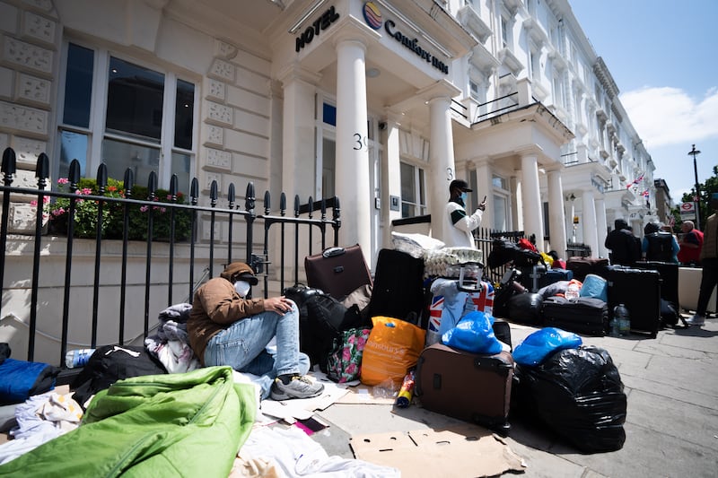 A view of the scene outside the Comfort Inn hotel on Belgrave Road in Pimlico, central London, where the Home Office have reportedly asked a group of refugees to be accommodated four to a room. Around 40 refugees were placed in the borough on Wednesday night "without appropriate accommodation or support available" and no prior communication with Westminster Council, the local authority. Picture date: Friday June 2, 2023. PA Photo. Rough sleeping teams have been supporting the refugees, according to the council, which claimed the Home Office had not put forward any resolution to the matter. See PA story POLITICS Migrants. Photo credit should read: James Manning/PA Wire
