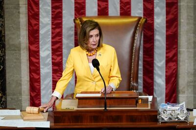 Ms Pelosi gavels the House into session. AP