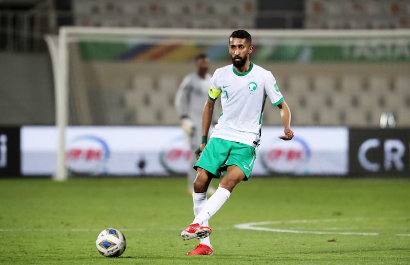 Salman Alfaraj of Saudi Arabia in action during the World Cup qualifier against China at Sharjah Stadium. The match finished 1-1. All photos: Pawan Singh / The National  