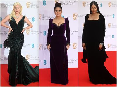 Lady Gaga, Salma Hayek and Naomi Campbell wore velvet designs to attend the 2022 British Academy Film Awards at the Royal Albert Hall in London. Getty Images, AFP