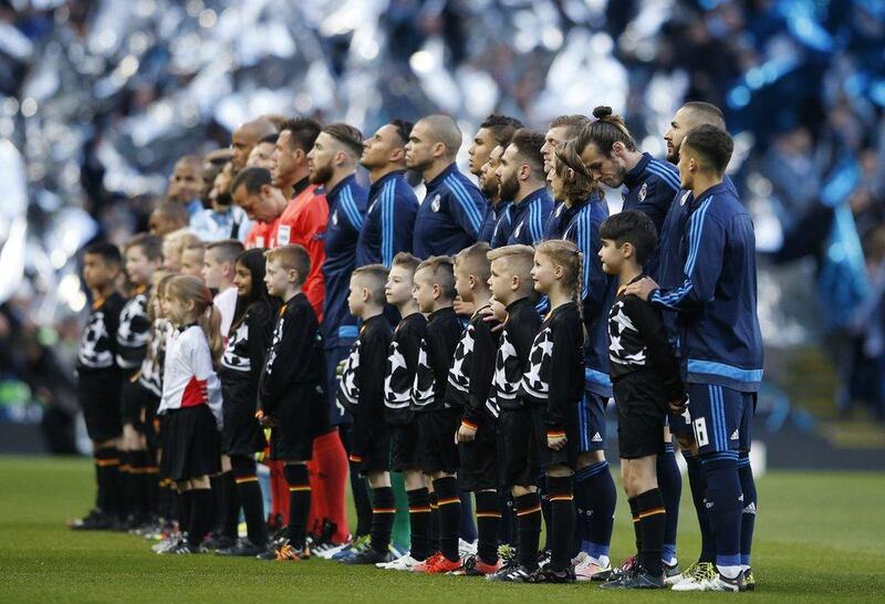 Real Madrid and Manchester City line up before the game. Phil Noble / Reuters
