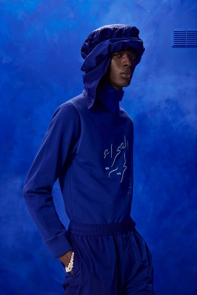 Much of the spring/summer 2023 collection was in indigo blue, such as this look and headscarf, that echos the nomadic Tuareg of the Sahara. Photo: Qasimi