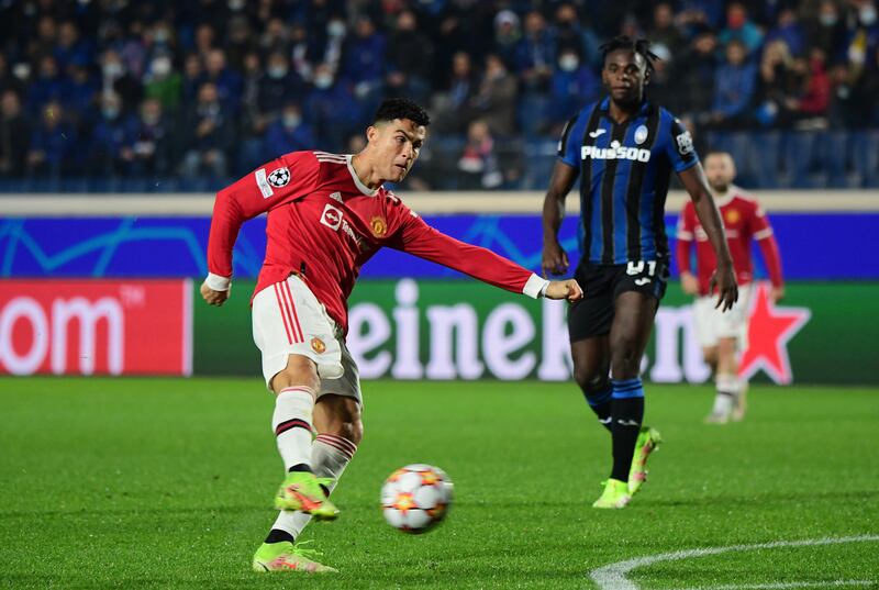 Manchester United's Cristiano Ronaldo volleys home an injury-time equaliser to earn his team a 2-2 Champions League draw at Atalanta on Tuesday, November 3. Reuters