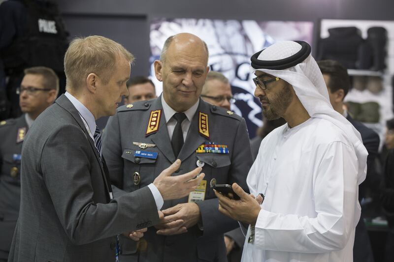 Sheikh Mohammed, right, with Lt Gen Arto Raty Deputy prime minister of Finland, centre, and a member of the Finnish delegation. Mohamed Al Hammadi / Crown Prince Court — Abu Dhabi