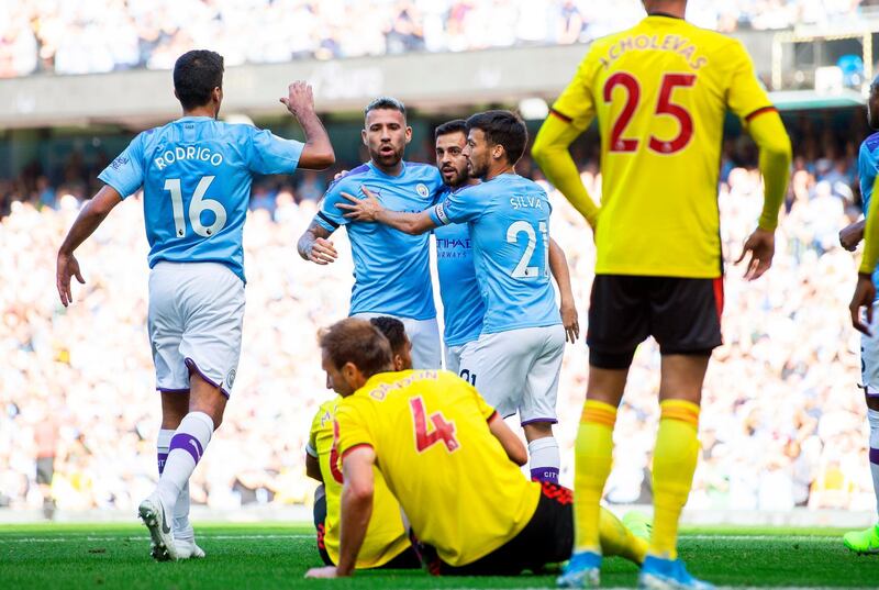 Manchester City's Nicolas Otamendi celebrates with teammates after scoring to make it 5-0. EPA