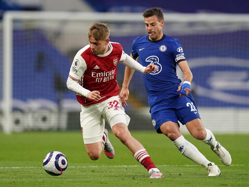 Arsenal's Emile Smith Rowe dribbles past Chelsea's Cesar Azpilicueta. EPA