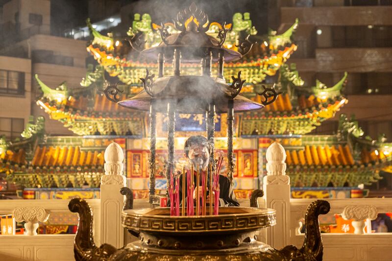 A man visits Mazu Miao temple to pray on the Lunar New Year's Eve in Yokohama Chinatown in Yokohama, Japan. Getty Images