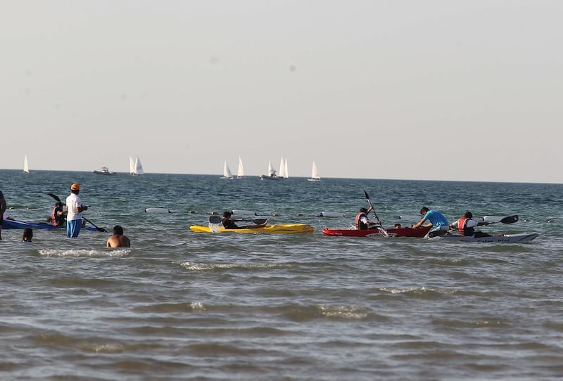 Participants kayak during the Al Gharbia Watersports Festival.