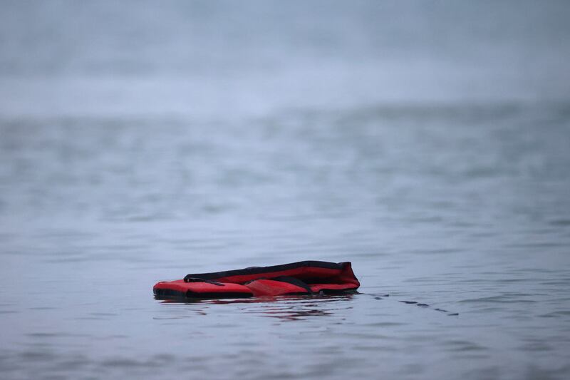 A life jacket is left in the water after a group of more than 40 migrants got on an inflatable dinghy to leave the coast of northern France and cross the Channel. Reuters