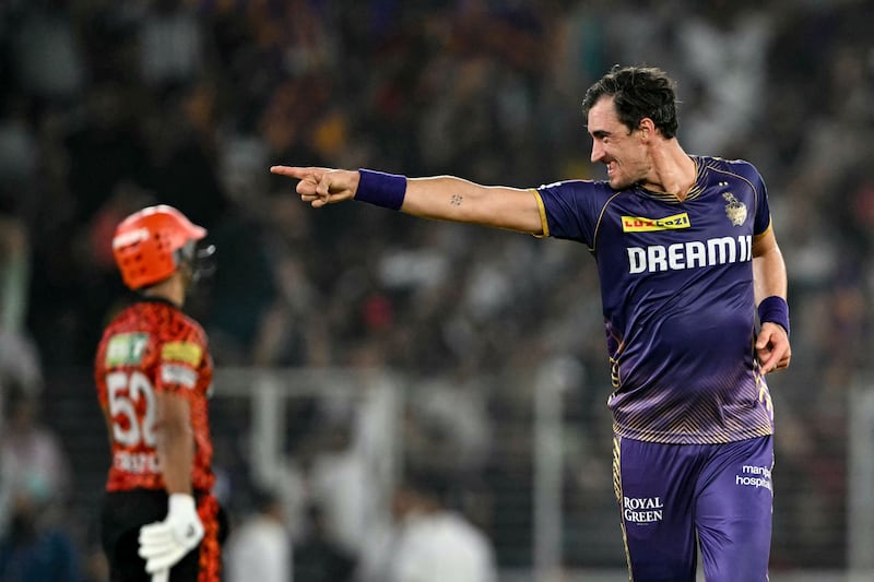 Kolkata Knight Riders' Mitchell Starc celebrates after taking the wicket of Sunrisers Hyderabad's Shahbaz Ahmed. AFP