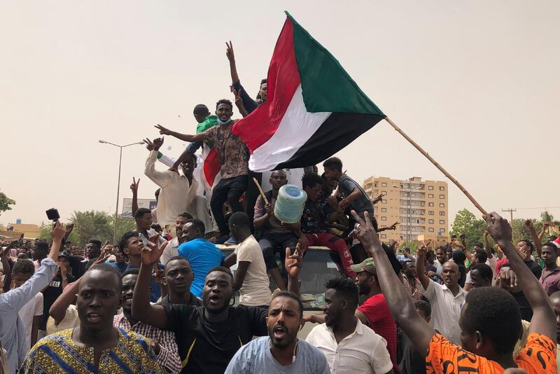 Sudanese shout slogans during a demonstration against the military council, in Khartoum, Sudan, on Sunday, June 30, 2019. AP Photo