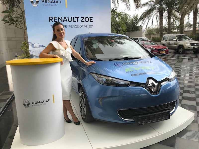 A Renault Zoe at the Hormuz Grand hotel in Muscat, one of the stop-offs on the road trip. Adam Workman / The National