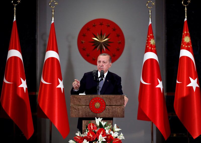 Turkish President Tayyip Erdogan speaks during an iftar dinner in Ankara, Turkey May 23, 2018. Murat Kula/Presidential Palace/Handout via REUTERS ATTENTION EDITORS - THIS PICTURE WAS PROVIDED BY A THIRD PARTY. NO RESALES. NO ARCHIVE.