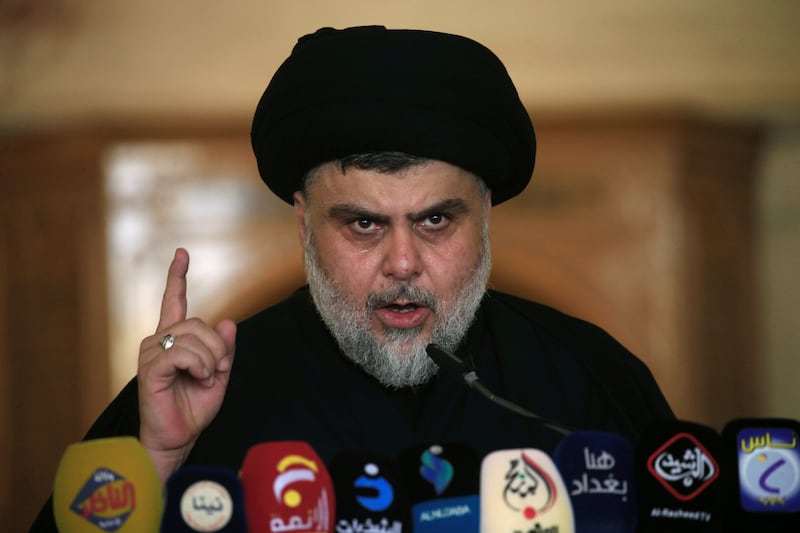 Iraqi Shi'ite radical leader Muqtada al-Sadr delivers a sermon to worshippers during Friday prayers at the Kufa mosque near Najaf, Iraq September 21, 2018.  REUTERS/Alaa Al-Marjani