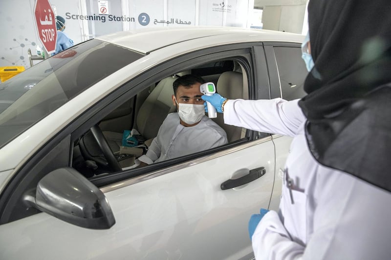 RAS AL KHAIMAH, UNITED ARAB EMIRATES. 12 APRIL 2020. The Ras Ak Khaimah National Screening Center in RAK city that forms part of the drive-through testing centres that opened across the emirates last week. Emirati Abdullah Al Mahrouzi gets tested. (Photo: Antonie Robertson/The National) Journalist: Ruba Haza. Section: National.