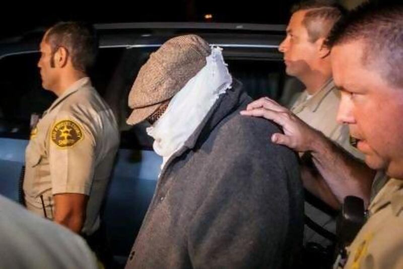 Nakoula Basseley Nakoula is escorted from his home by Los Angeles County Sheriff's officers on September 15.