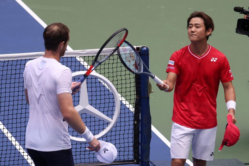 Andy Murray is congratulated by Yoshihito Nishioka. Getty