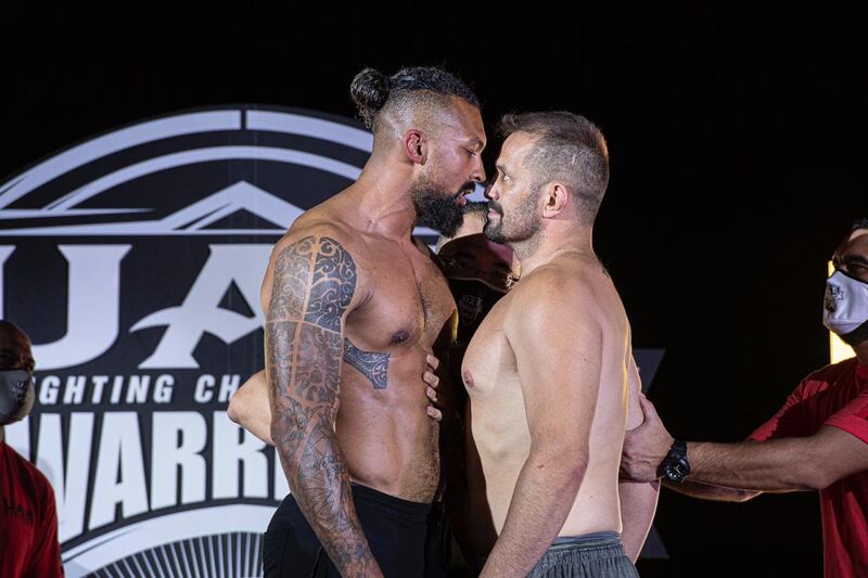 Chi Lewis-Parry, left, and Fabio Maldonado face off after the weigh-in ahead of Friday’s UAE Warriors 13 in Dubai. Courtesy UAE Warriors.