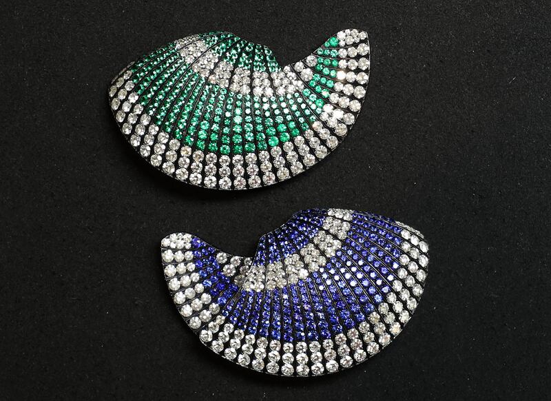 Fan earrings with diamonds, emeralds and sapphires by JAR at Christie's Dubai. All photos: Chris Whiteoak / The National
