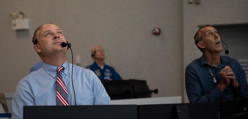 Norm Knight, deputy director of Flight Operations at Nasa's Johnson Space Center, watches the launch of a SpaceX Falcon 9 rocket carrying the company's Crew Dragon spacecraft on the Demo-2 mission with Nasa astronauts Douglas Hurley and Robert Behnken onboard, in firing room four of the Launch Control Centre at Nasa's Kennedy Space Centre in Cape Canaveral, Florida, US.  EPA