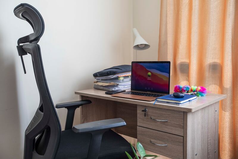 The desk and chair used by Ailan when she's working from home.